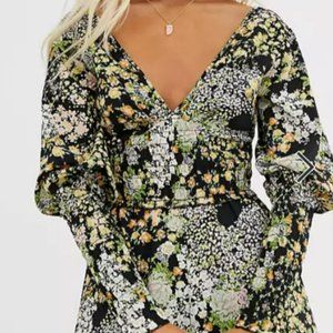 ASOS DESIGN Shirred Waist & Long sleeve V Neck Romper in Floral Print